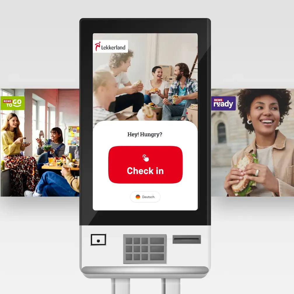Lekkerland self-service kiosk with "Hey! Hungry? Check in" touchscreen, flanked by REWE TO GO and REWE ready branded UI